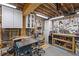 Basement workshop area with storage cabinets, peg boards, and shop tools at 7615 Laurel Oak Dr, Suwanee, GA 30024