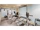 Home gym featuring weightlifting equipment, Everlast punching bag, and exercise bike at 7615 Laurel Oak Dr, Suwanee, GA 30024