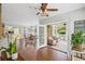 Open-concept living room with access to a screened-in porch at 7615 Laurel Oak Dr, Suwanee, GA 30024