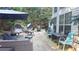 Backyard with umbrella, seating, table, and backyard decor at 1245 Cedar Oak Ln, Lawrenceville, GA 30043