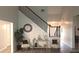 Inviting entryway featuring a staircase, modern décor, and luxury vinyl flooring at 1245 Cedar Oak Ln, Lawrenceville, GA 30043