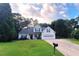 Charming two-story home featuring a well-manicured lawn, an attached two-car garage, and classic curb appeal at 1245 Cedar Oak Ln, Lawrenceville, GA 30043
