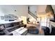 Open living room showcasing a soaring ceiling, modern decor, and luxury vinyl flooring at 1245 Cedar Oak Ln, Lawrenceville, GA 30043