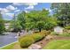 The community entrance welcomes you with lush landscaping and signage to Parkwood Place Condominiums at 1250 Parkwood Se Cir # 1213, Atlanta, GA 30339