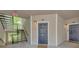 Unit 1213 entrance featuring a black front door, overhead lantern, and a small entrance mat at 1250 Parkwood Se Cir # 1213, Atlanta, GA 30339