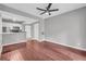 Spacious living room featuring hardwood floors and an open view to the kitchen at 1250 Parkwood Se Cir # 1213, Atlanta, GA 30339