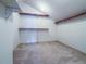 Walk-in closet featuring carpet and shelves, ready for customizable organization at 3836 Loch Highland Ne Pkwy, Roswell, GA 30075