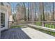 Back deck includes built-in bench seating and access to backyard at 4271 Weston Sw Dr, Lilburn, GA 30047