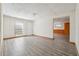 Basement features laminate flooring, white painted walls, and a separate room at 4271 Weston Sw Dr, Lilburn, GA 30047