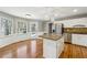 Open kitchen features stainless steel appliances, granite countertops, and a kitchen island at 4271 Weston Sw Dr, Lilburn, GA 30047