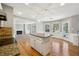 Spacious kitchen with granite countertops that opens to the living room at 4271 Weston Sw Dr, Lilburn, GA 30047
