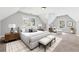 Digitally staged main bedroom with carpeting, multiple windows, and neutral decor at 4271 Weston Sw Dr, Lilburn, GA 30047