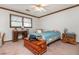 Bedroom with a cedar chest and a desk at 4800 Silverberry Nw Ln, Acworth, GA 30102