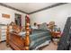 Bedroom with wallpaper border and wooden bed frame at 4800 Silverberry Nw Ln, Acworth, GA 30102
