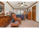 Bedroom features a rocking chair and a wooden dresser at 4800 Silverberry Nw Ln, Acworth, GA 30102