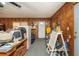Bonus room features wood paneling, white door and trim, and an open floor plan at 4800 Silverberry Nw Ln, Acworth, GA 30102