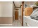 Hallway with laundry appliances and a doorway at 4800 Silverberry Nw Ln, Acworth, GA 30102