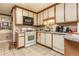 Kitchen with appliances and tiled floor at 4800 Silverberry Nw Ln, Acworth, GA 30102