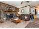 Living room showcasing a stone fireplace and comfortable seating arrangement at 4800 Silverberry Nw Ln, Acworth, GA 30102