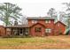 Exterior of a two-story home featuring a covered porch and a spacious backyard at 4800 Silverberry Nw Ln, Acworth, GA 30102