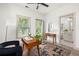 Bright room featuring a neutral palette, desk, chair and view of the bathroom at 1196 Wylie Se St, Atlanta, GA 30316