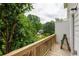 Spacious wooden deck with railing overlooking lush greenery at 1196 Wylie Se St, Atlanta, GA 30316
