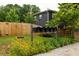 Exterior view of mailboxes and unit entrances nestled behind colorful flowers at 1196 Wylie Se St, Atlanta, GA 30316