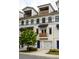 Stylish townhome exterior shows individual garages and attractive modern design elements at 1196 Wylie Se St, Atlanta, GA 30316