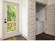 Bright laundry area with sliding door, a modern washer, and a dryer at 1196 Wylie Se St, Atlanta, GA 30316