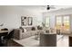 Cozy living room is furnished with a sectional sofa, armchairs and modern decor at 1196 Wylie Se St, Atlanta, GA 30316