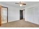 Bright bedroom with neutral paint, carpet floors and attached bathroom at 3332 Oak Grove Rd, Loganville, GA 30052