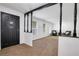 Inviting entryway featuring a decorative front door and a view into a spacious living area with natural light at 3332 Oak Grove Rd, Loganville, GA 30052