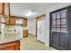 Functional kitchen with granite countertops, ample cabinet space, and modern white appliances at 3332 Oak Grove Rd, Loganville, GA 30052