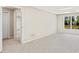 Basement area with access to other rooms, and a window with outside views at 11100 Chandon Way, Johns Creek, GA 30097