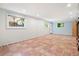 Finished basement featuring tile floors, and two windows for great natural light at 1492 Sagewood Cir, Stone Mountain, GA 30083