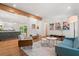 Open-concept living room with hardwood floors and modern decor at 1492 Sagewood Cir, Stone Mountain, GA 30083