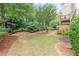 Spacious backyard offering a serene escape with privacy and mature trees at 4228 Laurel Creek Se Ct # 6, Smyrna, GA 30080