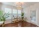 Lots of natural lighting brighten this bar area with a bar, stools and a chandelier at 4228 Laurel Creek Se Ct # 6, Smyrna, GA 30080