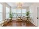 Bright bar area features lots of natural lighting, a bar, stools and a chandelier at 4228 Laurel Creek Se Ct # 6, Smyrna, GA 30080