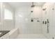 A luxurious walk-in shower boasts a dual rainfall shower system and a built-in bench at 4228 Laurel Creek Se Ct # 6, Smyrna, GA 30080