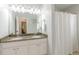 Spacious bathroom featuring a dual vanity with granite countertops and a shower-tub combo at 4228 Laurel Creek Se Ct # 6, Smyrna, GA 30080