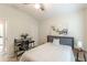 Comfortable bedroom featuring a desk area, an accent painting, and a comfortable bed at 4228 Laurel Creek Se Ct # 6, Smyrna, GA 30080