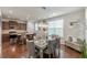Open-concept dining and kitchen area with stainless appliances and bar stool seating at 4228 Laurel Creek Se Ct # 6, Smyrna, GA 30080