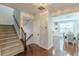 Inviting foyer showcasing hardwood floors and a staircase leading to the upper level at 4228 Laurel Creek Se Ct # 6, Smyrna, GA 30080