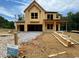 New construction homesite in Ashbury, ready for customization and finishing touches at 723 Crest Line Trl, Powder Springs, GA 30127