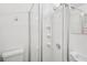 Bathroom showcasing a shower with glass doors, a sink and toilet at 2858 Valley Ridge Dr, Decatur, GA 30032