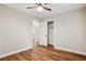 Bedroom features wood floors, ceiling fan, walk-in closet and neutral color palette at 2858 Valley Ridge Dr, Decatur, GA 30032