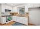 Traditional kitchen with white cabinetry, granite countertops, and stainless steel appliances at 2858 Valley Ridge Dr, Decatur, GA 30032