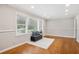 Open living room boasting hardwood floors, recessed lighting and a large window at 2858 Valley Ridge Dr, Decatur, GA 30032