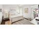 Bright bedroom featuring vaulted ceilings, neutral walls, and lots of natural light at 333 Lauren Ln, Woodstock, GA 30188